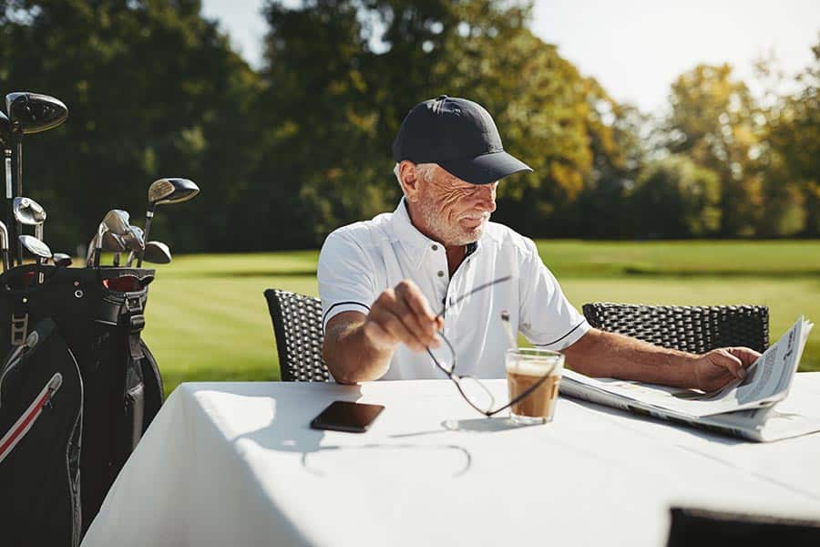 Man enjoying a coffee on the golf course