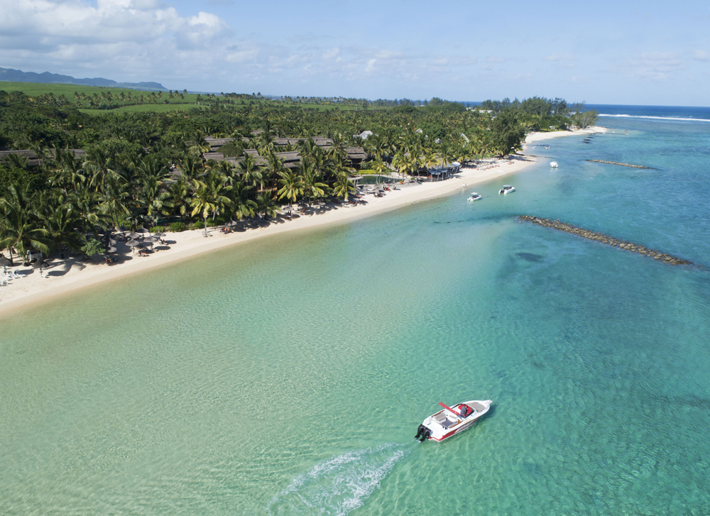 Aerial view of boat on the shore of the island of Mauritius.