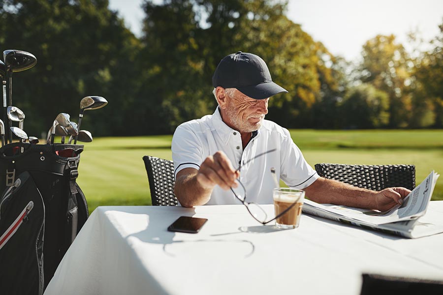 Man enjoying a coffee at the golf course